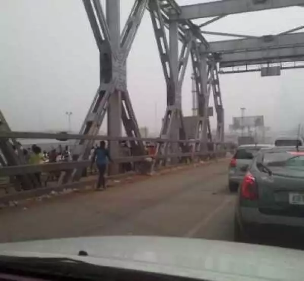 Photos: Biafra Agitators Burn Two Trailers At Onitsha Head Bridge 